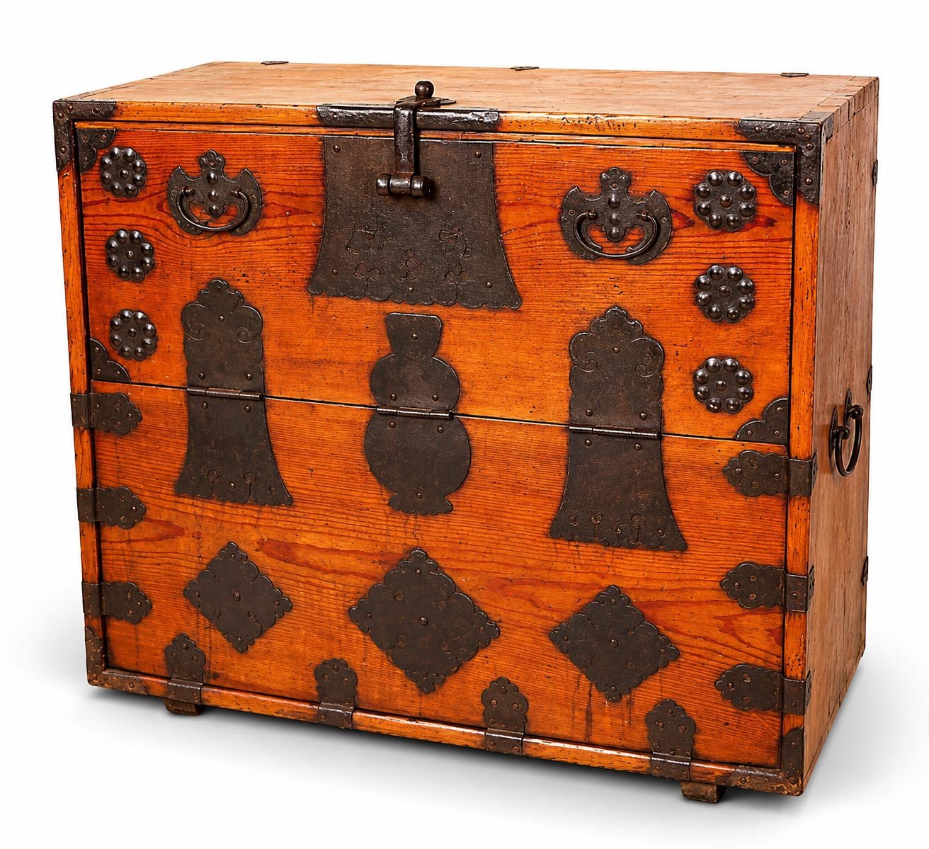 Traditional Korean Gangwon-do bandaji chest made of reddish wood with decorative iron fittings, shaped hinges, circular mounts and geometric metal plates.